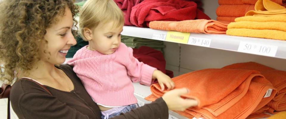 mother with baby in shop