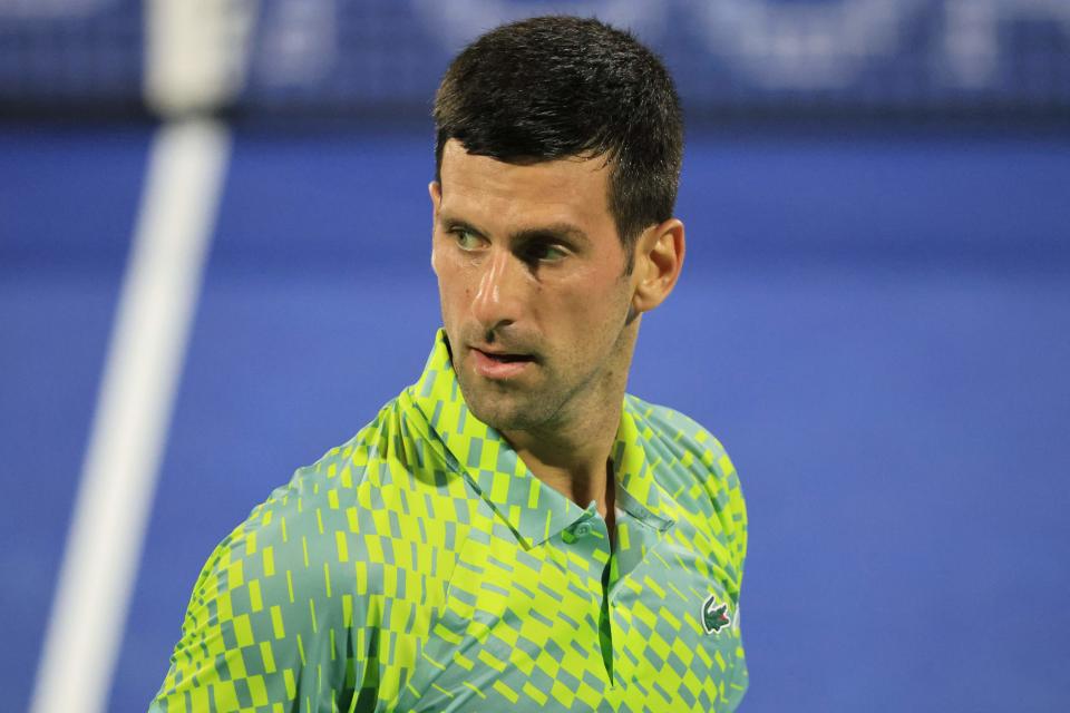 Serbia's Novak Djokovic reacts during his match with Russia's Daniil Medvedev (not pictured) at the ATP Dubai Duty Free Tennis Championship semi-final match in Dubai, on March 3, 2023. (Photo by Karim SAHIB / AFP) (Photo by KARIM SAHIB/AFP via Getty Images)