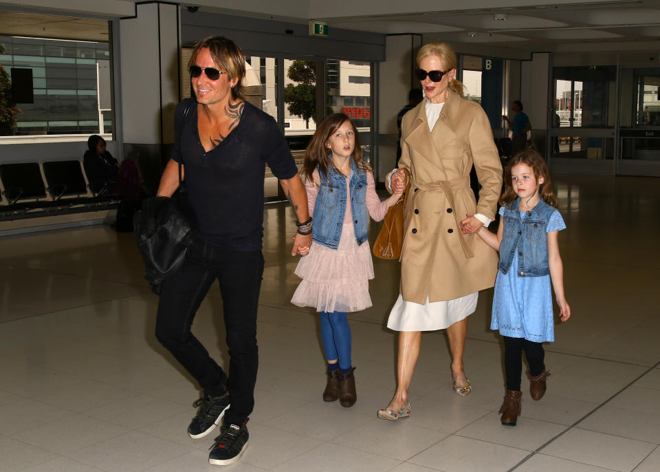 Nicole and Keith arriving at Sydney airport with their children last year. Source: Getty