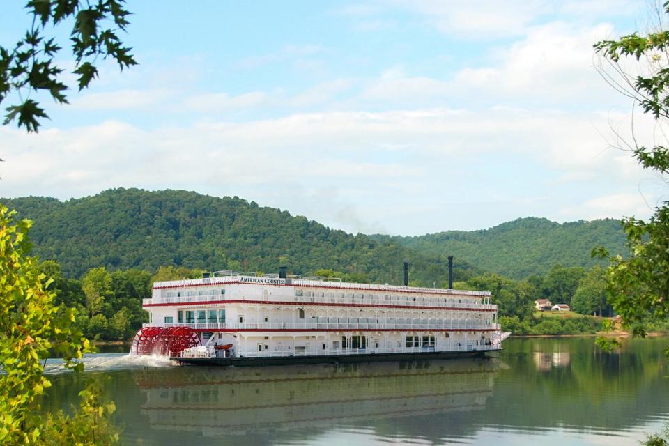 Exterior of the American Countess sailing down a river