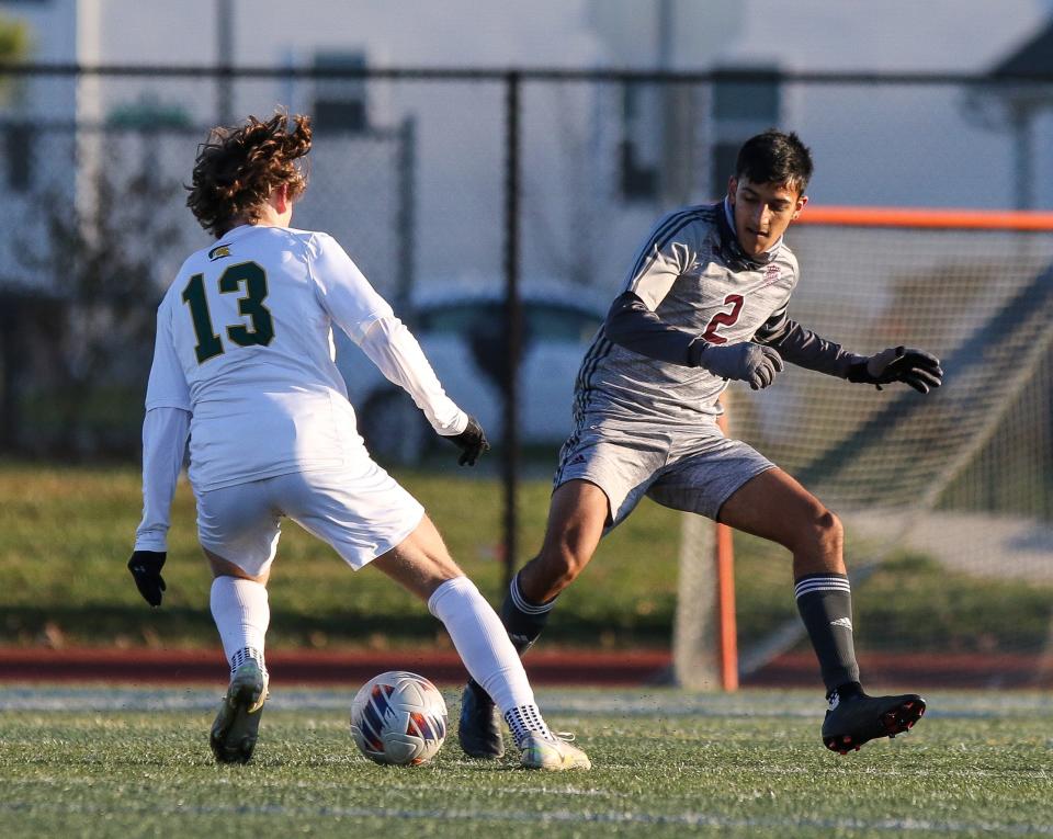 Saint Mark’s Kieran O’Connor (left).