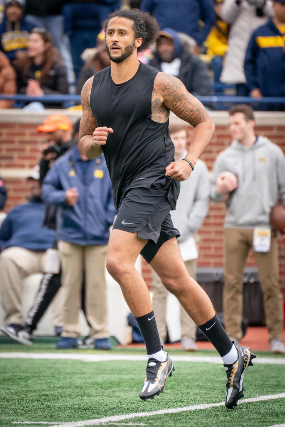 Colin Kaepernick participates in a throwing exhibition during halftime of the Michigan spring football game at Michigan Stadium on April 2, 2022 in Ann Arbor, Michigan. - Credit: Jaime Crawford/Getty Images