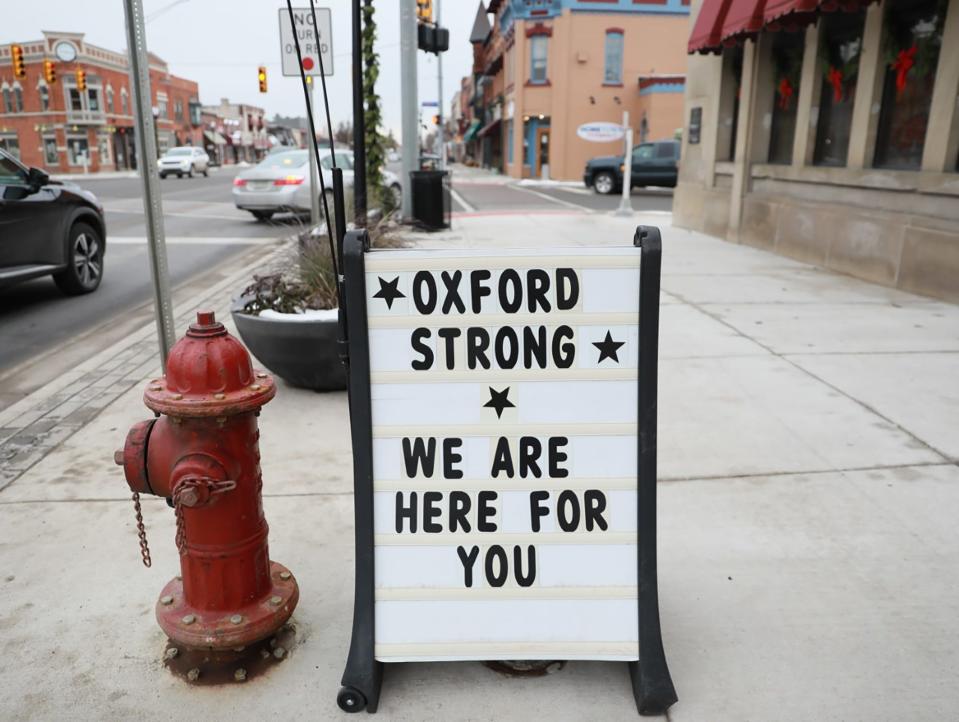 Oxford Strong signs are popping up in and around downtown Oxford, Mich. to show his support for the community after the school shooting at the school on Dec. 1, 2021. 