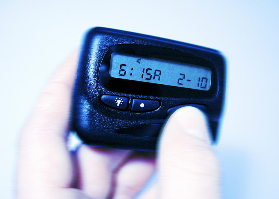 Close-up of a pager in someone's hand