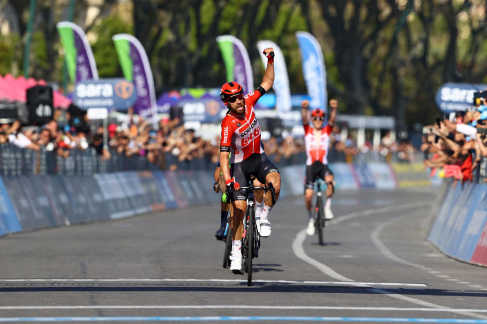 NAPOLI ITALY  MAY 14 Thomas De Gendt of Belgium and Team Lotto Soudal celebrates winning ahead of Davide Gabburo of Italy and Team Bardiani CSF Faizane and Jorge Arcas Pea of Spain and Movistar Team during the 105th Giro dItalia 2022 Stage 8 a 153km stage from Napoli to Napoli  Giro  WorldTour  on May 14 2022 in Napoli Italy Photo by Michael SteeleGetty Images