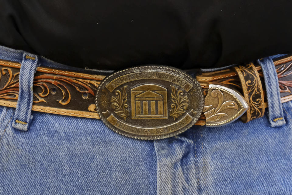 Pastor Bart Barber, president of the Southern Baptist Convention, wears a Southwestern Baptist Theological Seminary belt buckle at a livestock event hosted by local chapters of the 4-H Club and National FFA Organization in McKinney, Texas, on Saturday, Sept. 24, 2022. (AP Photo/Audrey Jackson)