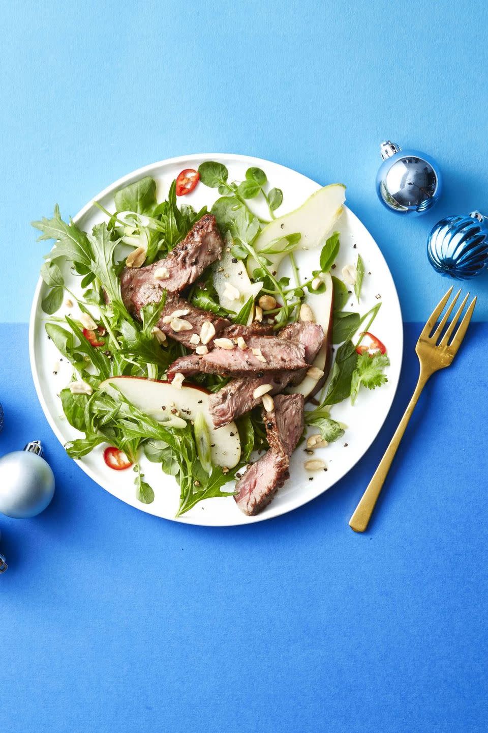 <p>Tossed in a spicy, limey, funky dressing and topped with fresh cilantro and peanuts, this salad makes an enviable desk lunch or light dinner.</p><p><em><a href="https://www.goodhousekeeping.com/food-recipes/easy/a46934/thai-steak-and-pear-salad-recipe/" rel="nofollow noopener" target="_blank" data-ylk="slk:Get the recipe for Thai Steak and Pear Salad »;elm:context_link;itc:0;sec:content-canvas" class="link ">Get the recipe for Thai Steak and Pear Salad »</a></em></p><p><strong>RELATED: </strong><a href="https://www.goodhousekeeping.com/food-recipes/healthy/g180/healthy-salads/" rel="nofollow noopener" target="_blank" data-ylk="slk:31 Healthy Salads for a Very Filling, Very Un-boring Meal;elm:context_link;itc:0;sec:content-canvas" class="link ">31 Healthy Salads for a Very Filling, Very Un-boring Meal</a></p>