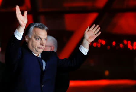 Hungarian Prime Minister Viktor Orban addresses the supporters after the announcement of the partial results of parliamentary election in Budapest, Hungary, April 8, 2018. REUTERS/Leonhard Foeger