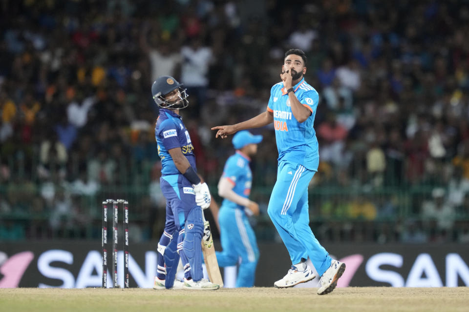 India's Mohammed Siraj celebrates the wicket of Sri Lanka's Dimuth Karunaratne during the Asia Cup cricket match between Sri Lanka and India in Colombo, Sri Lanka, Tuesday, Sept. 12, 2023. (AP Photo/Eranga Jayawardena)