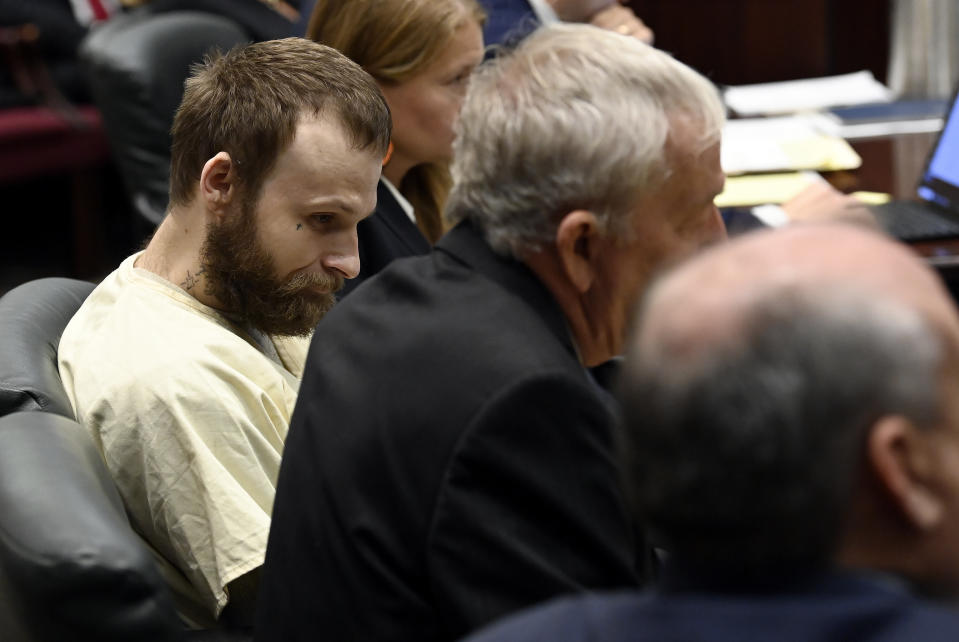 Michael Cummins sits with attorneys during his court hearing at the Sumner County Justice Center on Wednesday, Aug. 16, 2023, in Gallatin Tenn. Cummins who killed eight people in rural Westmoreland over several days in April 2019, has pleaded guilty to eight counts of first-degree murder in exchange for a sentence of life without parole. (Mark Zaleski/The Tennessean via AP, Pool)