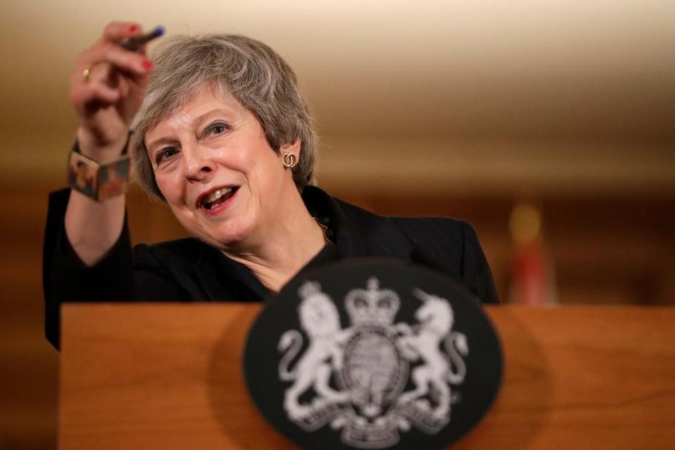 Theresa May seemed in good spirits as she took questions from the media at a press conference on Thursday night (AP)