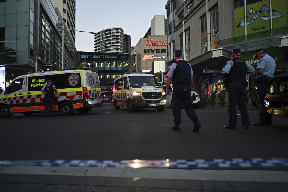 Emergency services are seen at Bondi Junction after multiple people were stabbed at the Westfield Bondi Junction shopping centre in Sydney, Australia, Saturday, April 13, 2024. Multiple people were stabbed Saturday, and police shot someone, at a busy Sydney shopping center, media reports said. (Steven Saphore/AAP Image via AP)