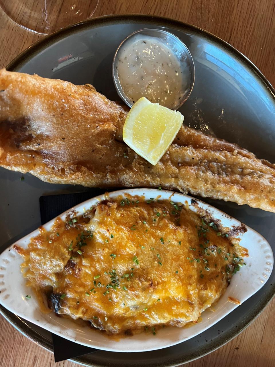 Walleye, a classic dish at a supper club, is on the menu at Guesthouse Tavern & Oyster in Waukee.