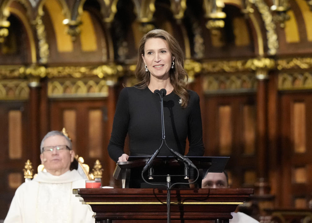 Caroline Mulroney, daughter of former Prime Minister Brian Mulroney, speaks at the pulpit during his funeral in Montreal on Saturday, March 23, 2024. THE CANADIAN PRESS/Ryan Remiorz