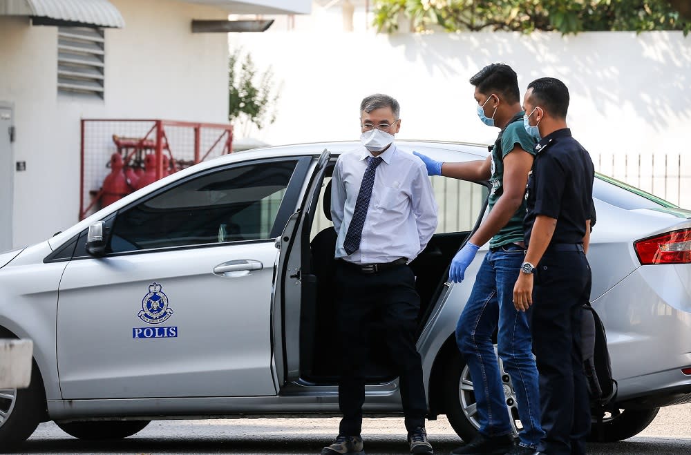 Consultant Cardiologist Dr Ong Hean Teik is pictured arriving at the George Town Court Complex March 30, 2020. — Picture by Sayuti Zainudin