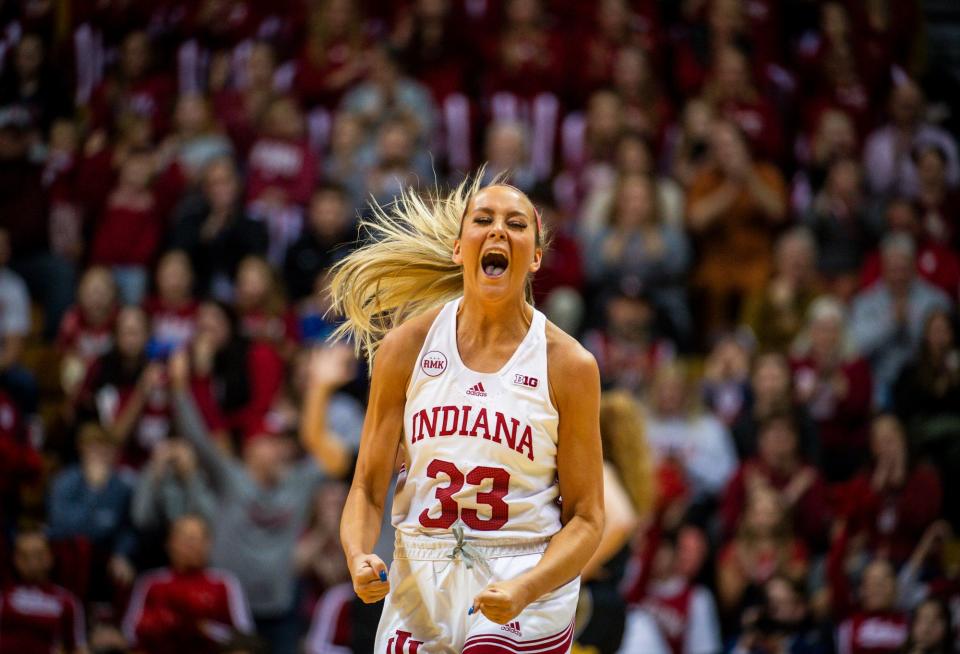 Indiana's Sydney Parrish (33) reacts to hitting her second three-pointer in a row during the first half of the Indiana versus Michigan women's basketball game on Thursday, Jan. 4, 2024.