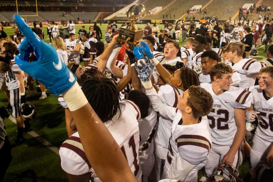 Picayune players celebrate after winning the 5A State Championship at M.M. Roberts Stadium in Hattiesburg on Friday, Dec. 2, 2022.