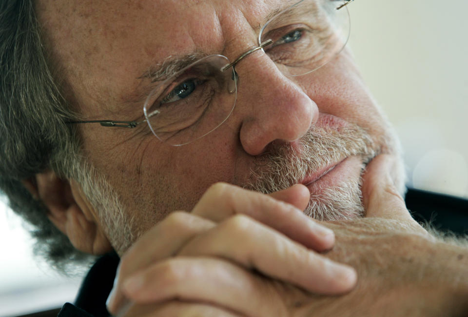 FILE - In this Jan. 9, 2010 file photo, then New Jersey Gov. Jon Corzine listens during an interview with The Associated Press at his home in Hoboken, N.J. The millions that Corzine amassed at Goldman Sachs have become an alluring target for investors who were crushed by the collapse of MF Global, the brokerage firm he led until early Nov. 2011. And Corzine isn’t the only former MF executive who may be financially vulnerable after the eighth-largest bankruptcy in U.S. history.(AP Photo/Rich Schultz, File)