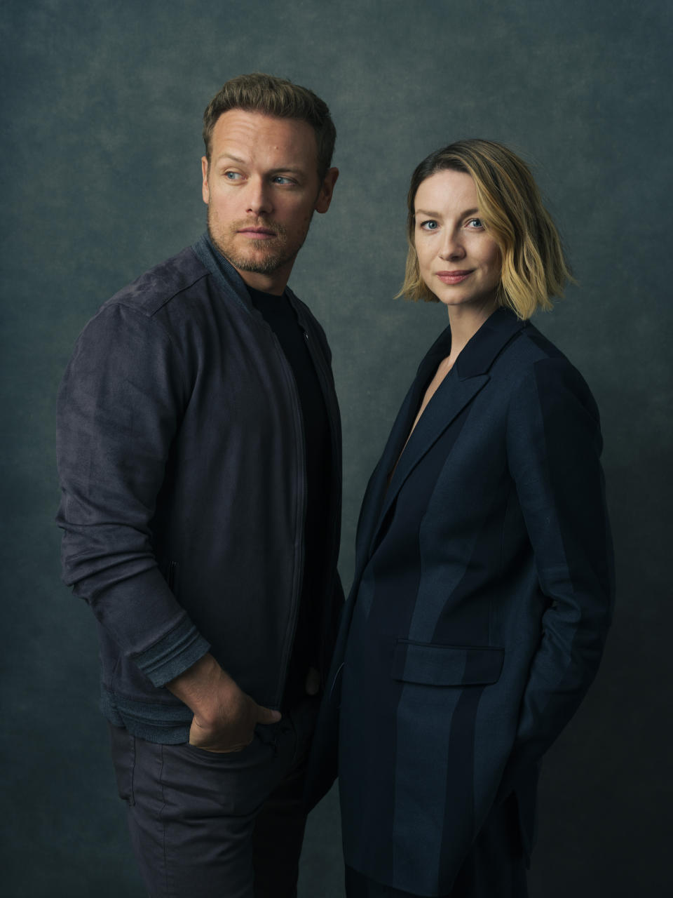 Sam Heughan, left, and Caitriona Balfe pose for a portrait to promote the series "Outlander" on Thursday, June 8, 2023, in New York. (Photo by Drew Gurian/Invision/AP)