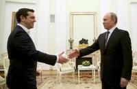 Russian President Vladimir Putin (R) shakes hands with Greek Prime Minister Alexis Tsipras during a meeting at the Kremlin in Moscow, April 8, 2015. REUTERS/Alexander Zemlianichenko/Pool