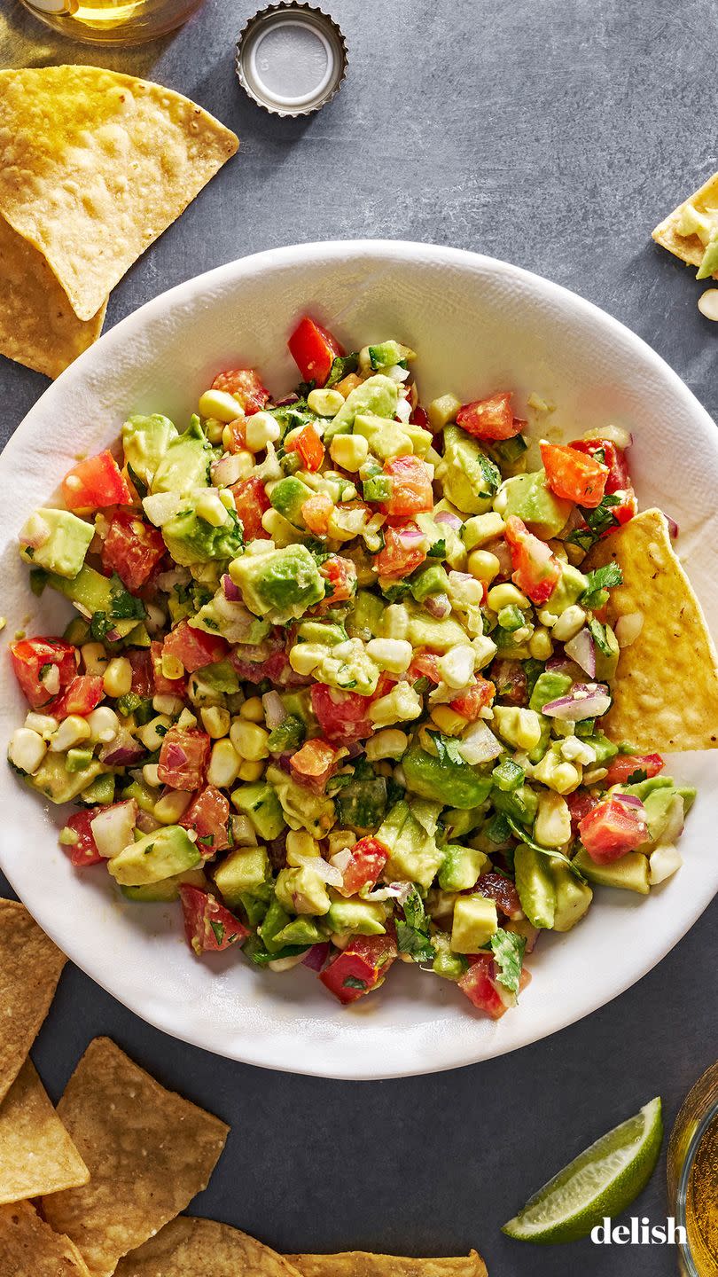 diced avocado tossed with tomato, fresh corn, red onion, jalapeno, cilantro, and lime juice, served with tortilla chips