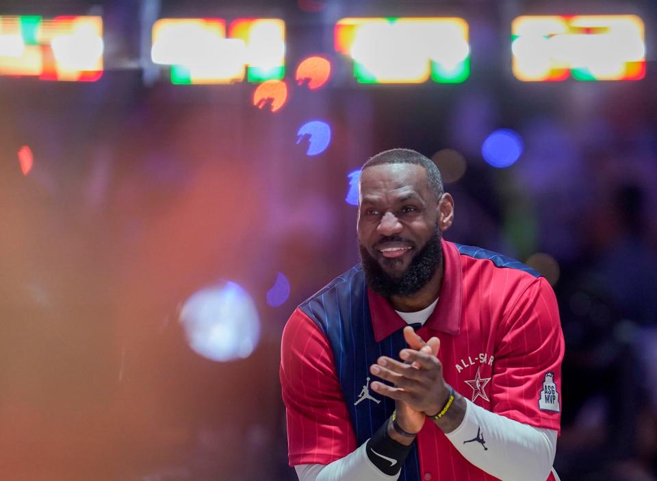 Western Conference forward LeBron James (23) of the Los Angeles Lakers claps during player introductions Sunday, Feb. 18, 2024, ahead of the 73rd NBA All-Star game at Gainbridge Fieldhouse in downtown Indianapolis.