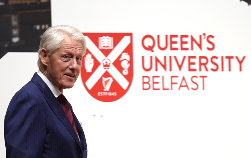 Former US president Bill Clinton arrives to speak during the international conference to mark the 25th anniversary of the Belfast/Good Friday Agreement, at Queen's University Belfast, in Belfast, Wednesday April 19, 2023. (Niall Carson/Pool Photo via AP)