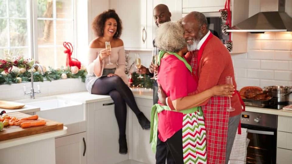 Adult family preparing dinner on Christmas Day