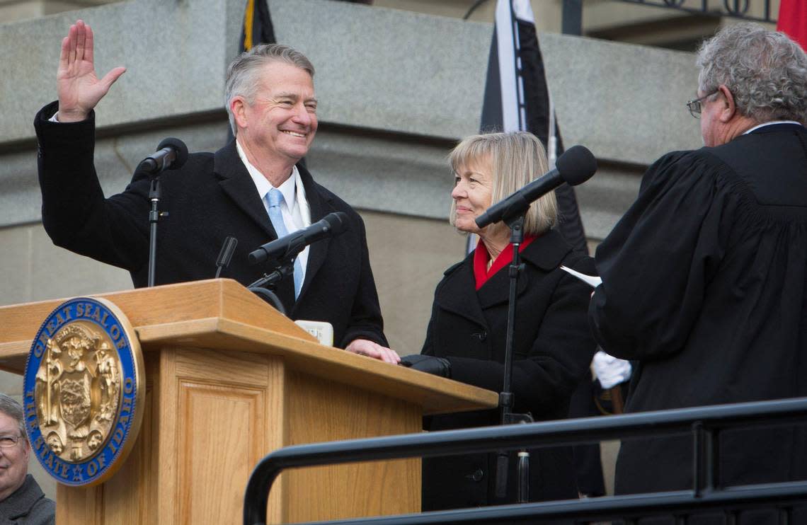 Idaho Gov. Brad Little, accompanied by his wife, Teresa Little, takes the oath of office in 2019, kicking off his first term as Idaho governor.