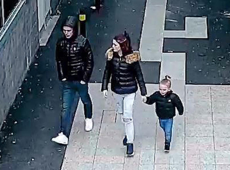 Video grab taken from CCTV of Stephen Waterson and Adrian Hoare with Alfie Lamb, on a shopping trip to Sutton on the day he died. (Metropolitan Police)