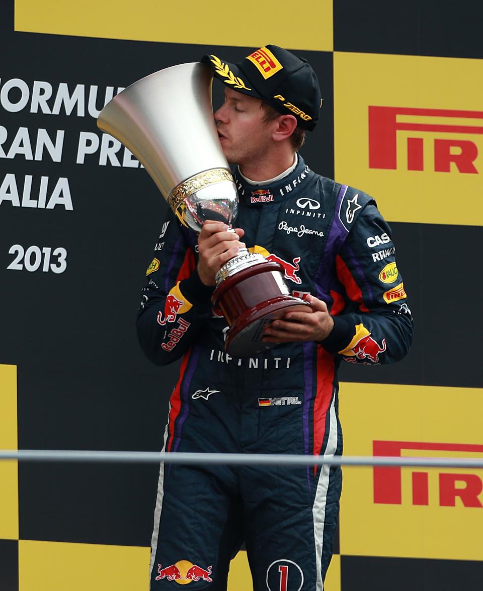 Red Bull Racing's Sebastian Vettel with the trophy on the podium after victory in the Italian Grand Prix and the Autodromo Nazionale Monza, Monza, Italy.