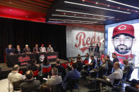 Cincinnati Reds' Nick Castellanos at table second from right, sits for questions from reporters during a news conference, Tuesday, Jan. 28, 2020, in Cincinnati. Castellanos signed a $64 million, four-year deal with the baseball club. (AP Photo/John Minchillo)