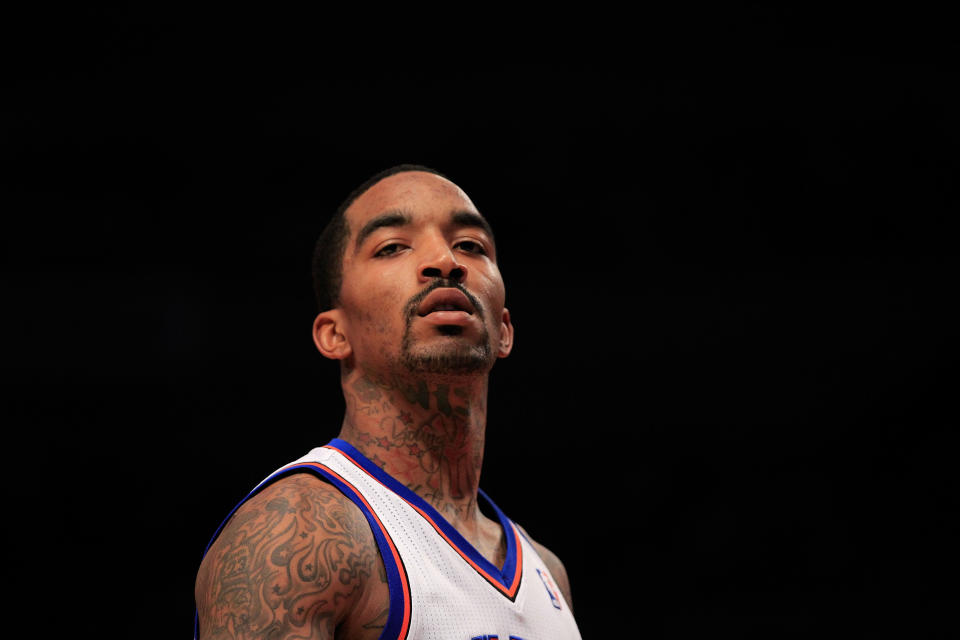 NEW YORK, NY - MARCH 28: J.R. Smith #8 of the New York Knicks looks on against the Orlando Magic at Madison Square Garden on March 28, 2012 in New York City. NOTE TO USER: User expressly acknowledges and agrees that, by downloading and/or using this Photograph, user is consenting to the terms and conditions of the Getty Images License Agreement. (Photo by Chris Trotman/Getty Images)