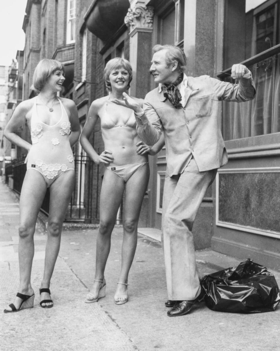 With bikini-clad actors Angela Scoular (left) and Carol Hawkins promoting the comedy show ‘Sextet’ at the Criterion Theatre, London, in 1977 (Getty)