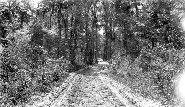 In the 1820s the federal government authorized an earthen road to be constructed from St. Augustine to Pensacola, with Tallahassee at its midpoint. This became the Old St. Augustine Road (still in use as a paved street in Tallahassee). The St. Augustine-Tallahassee leg of this road was constructed by enslaved individuals and a private contractor, John Bellamy. For this reason, the Old St. Augustine Road was also known as the Bellamy Road.