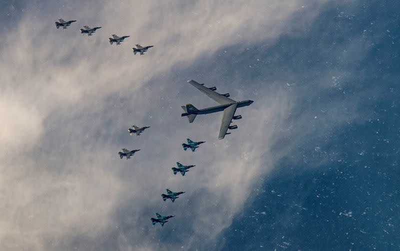 A B-52H Stratofortress from Minot Air Force Base, N.D., and six F-16 Fighting Falcons from Misawa Air Base, Japan, conduct bilateral joint training with four Japan Air Self-Defense Force F-2s off the coast of northern Japan