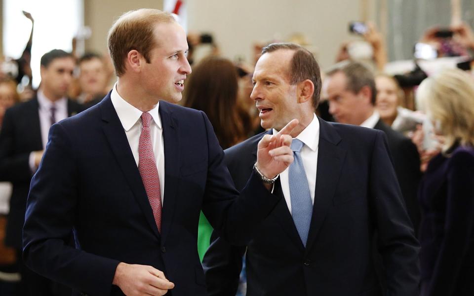Abbott with the Duke of Cambridge during a royal visit to Canberra in 2014 - GETTY IMAGES