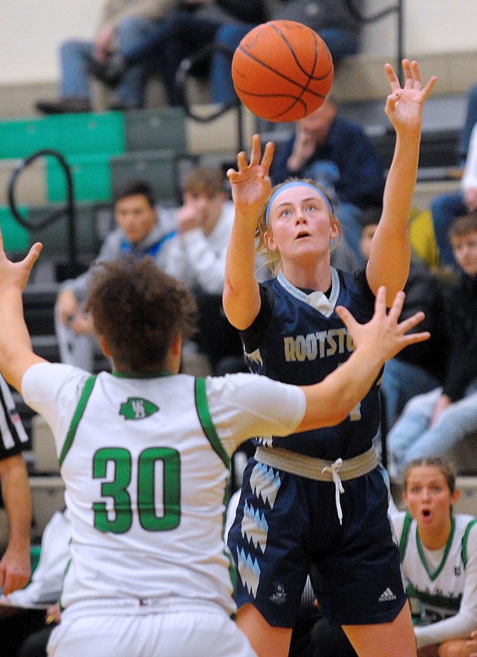 Rootstown's Lindsey Smith puts up a shot over West Branch's Mikalyn Fitts in a non-conference game at the West Branch Field House on Monday, January 23, 2023.