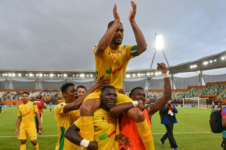 Benin captain and match-winner Steve Mounie (C) celebrates a 2026 World Cup qualifying victory over <a class="link " href="https://sports.yahoo.com/soccer/teams/nigeria-women/" data-i13n="sec:content-canvas;subsec:anchor_text;elm:context_link" data-ylk="slk:Nigeria;sec:content-canvas;subsec:anchor_text;elm:context_link;itc:0">Nigeria</a> in Abidjan (Issouf SANOGO)
