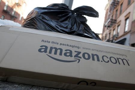 An Amazon box sits out with trash in the Brooklyn borough of New York January 29, 2016. REUTERS/Brendan McDermid