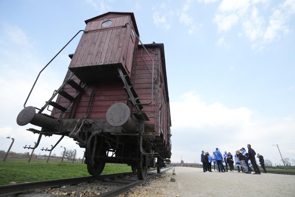 Jewish people visit the Auschwitz Nazi concentration camp after the March of the Living annual observance that was not held for two years due to the global COVID-19 pandemic, in Oswiecim, Poland, Thursday, April 28, 2022. Only eight survivors and some 2,500 young Jews and non-Jews are taking part in the annual march that is scaled down this year because of the war in neighboring Ukraine that is fighting Russia's invasion. (AP Photo/Czarek Sokolowski)
