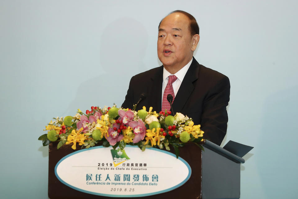 In this photo released by the Macao Government Office, newly elected Macao Chief Executive Ho lat-seng speaks after the election in Macao, Sunday, Aug. 25, 2019. An elite pro-Beijing panel has chosen a new leader for the Chinese casino gambling hub Macao. Ho was picked Sunday to be the next chief executive of the former Portuguese colony in a selection process with no other candidates. (Macao Government Office via AP)