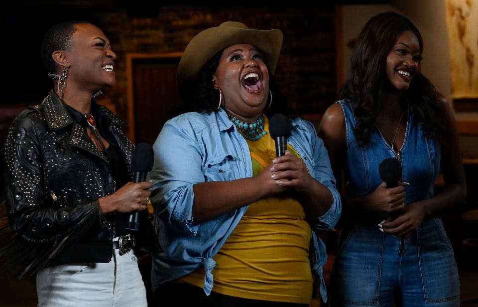 Trea Swindle, left, Dancia Hart, and Devynn Hart of Chapel Hart are inviewed by Rissi Palmer before the CMT Next Women of Country event at the City Winery on Wednesday, Sept. 28, 2022, in Nashville, Tenn. 