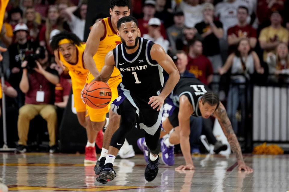 Kansas State guard Markquis Nowell (1) leads a fast break against Iowa State on Tuesday in Ames, Iowa. Nowell leads the Wildcats in scoring in Big 12 play with 22.1 points and 8.1 assists per game.