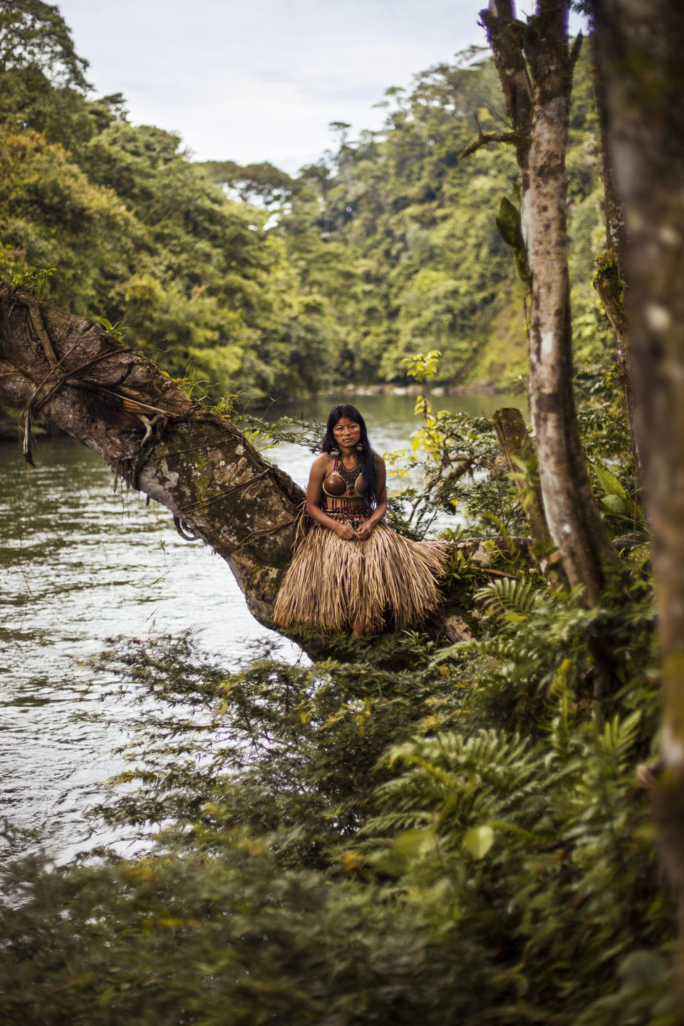 <p>“More and more tribes of Amazonia are starting to adopt modern clothes for everyday life. But they are still keeping their traditional clothes for important events. I photographed this young woman in her wedding outfit.” <i>[Photo: Mihaela Noroc]</i> </p>
