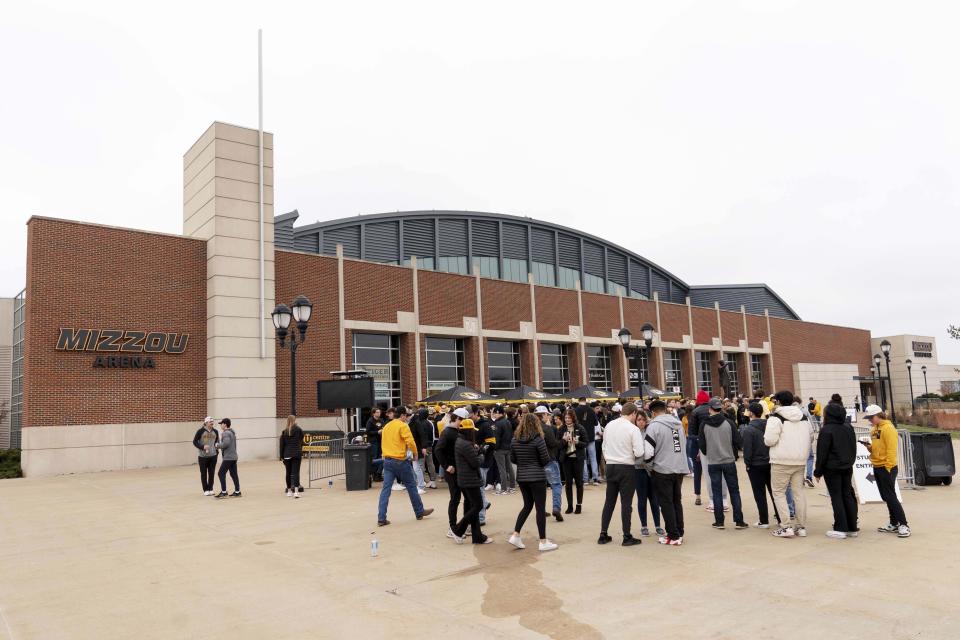 Missouri students stand in line to get in Mizzou Arena before the start of an NCAA college basketball game against Kansas Saturday, Dec. 10, 2022, in Columbia, Mo. (AP Photo/L.G. Patterson)