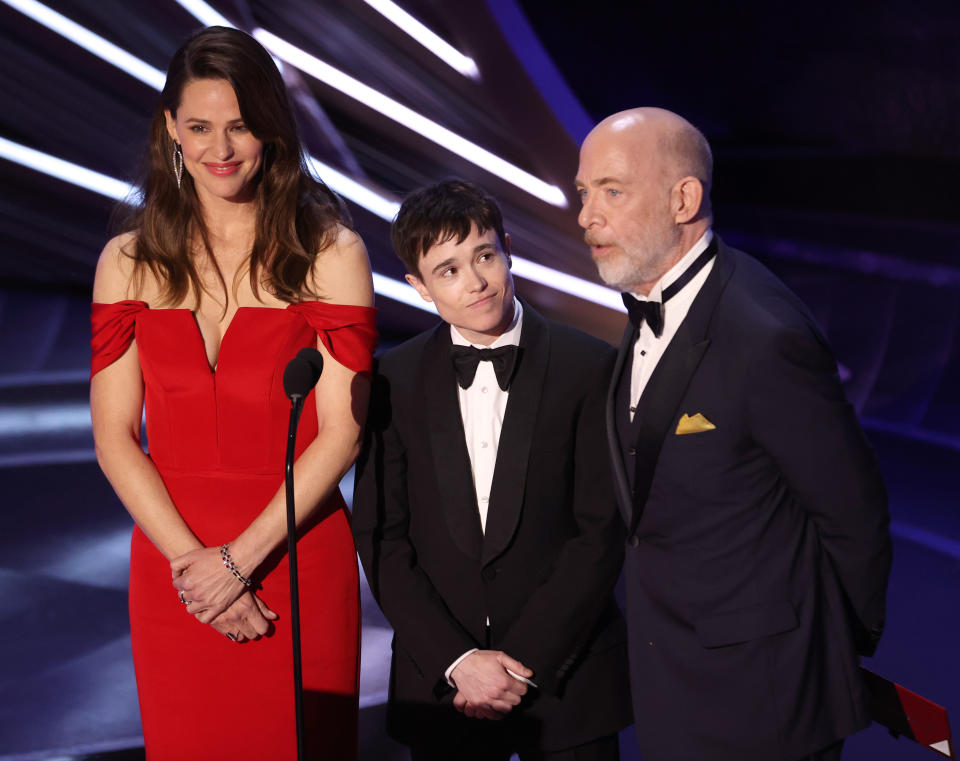 Jennifer Garner, Elliot Page, and J.K. Simmons speak onstage at the 94th Academy Awards held at Dolby Theatre at the Hollywood & Highland Center on March 27th, 2022 in Los Angeles, California. (Photo by Chris Polk/Variety/Penske Media via Getty Images)
