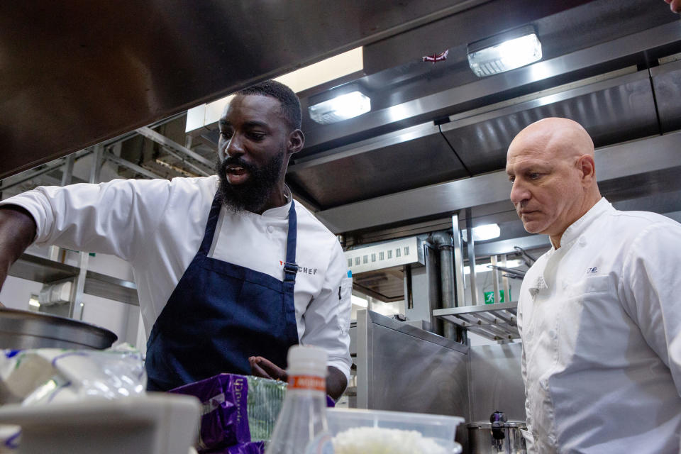 Eric Adjepong, left, and Tom Colicchio in season 16 of Top Chef.<span class="copyright">Carmo Correia—Bravo/NBCU Photo Bank/NBCUniversal/Getty Images</span>
