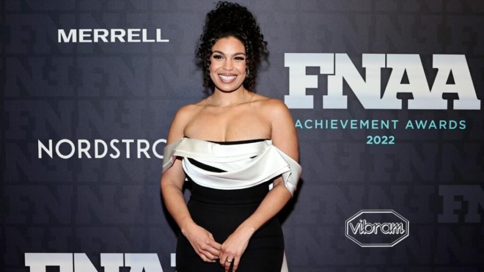 Jordin Sparks enjoys the shoes at the 2022 Footwear News Achievement Awards at Cipriani South Street in New York City.