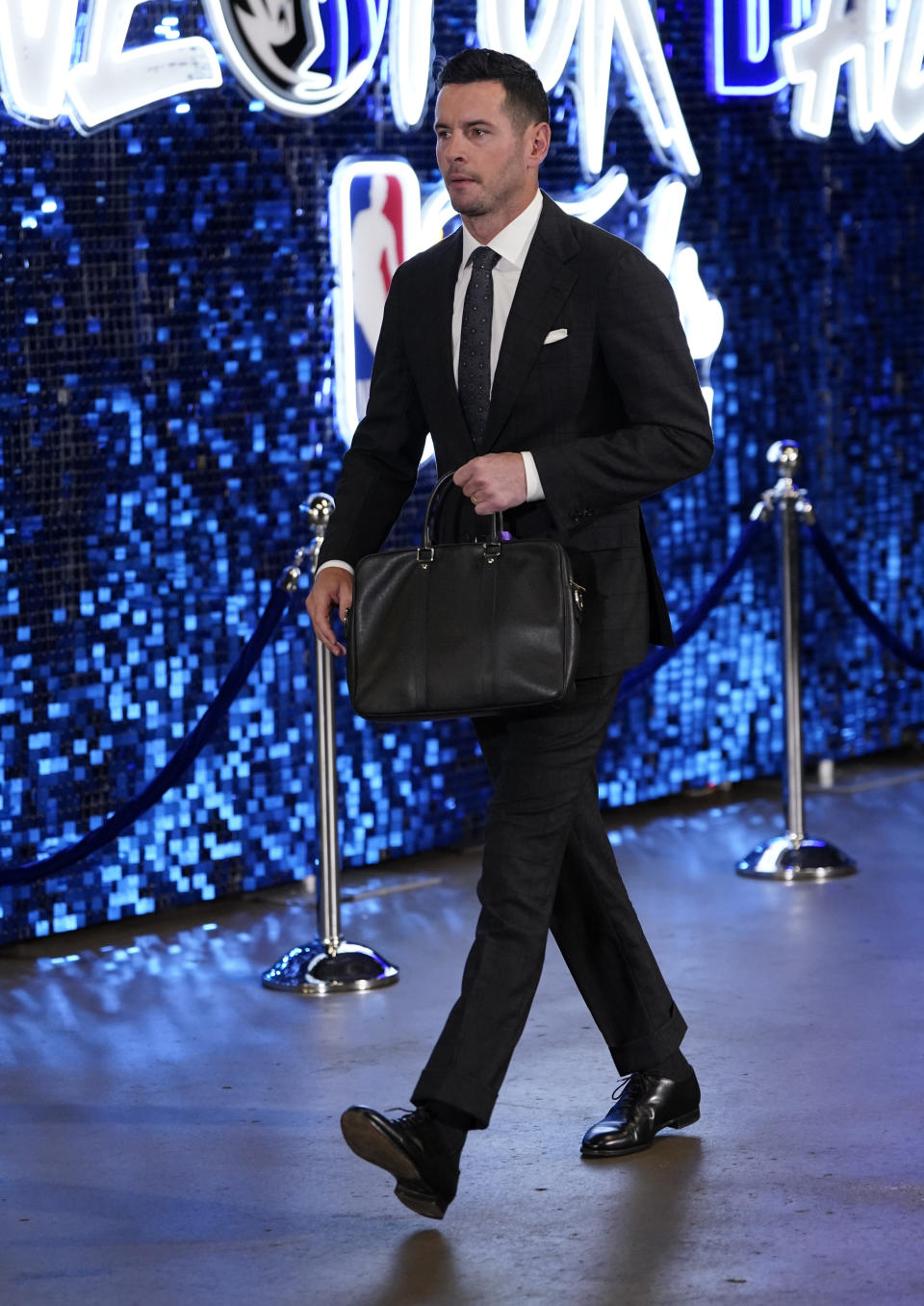 J.J. Redick arrives for Game 4 of the NBA basketball finals between the Dallas Mavericks and the Boston Celtics, Friday, June 14, 2024, in Dallas. (AP Photo/Sam Hodde)